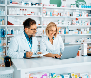 older male pharmacist with blonde female pharmacist 2_vertical-1